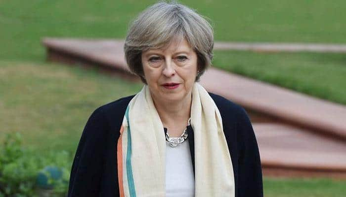 UK PM Theresa May narrowly avoids defeat in Parliament on trade laws