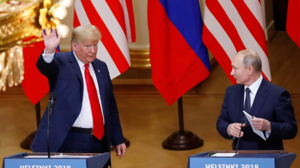 Donald Trump says he holds Vladimir Putin personally responsible for US election meddling