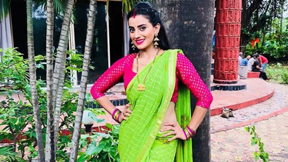 Bhojpuri beauty Akshara Singh sizzles in a green saree-See pic