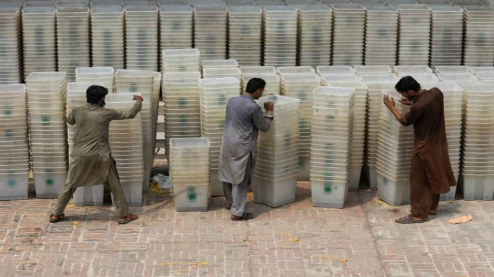 Pakistan elections: Probe ordered into reports of women being barred from voting