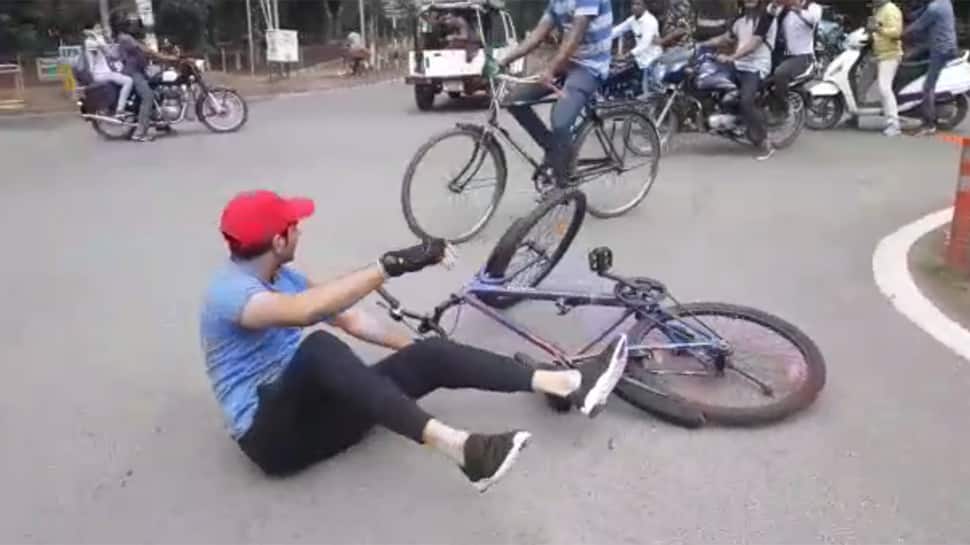 Tej Pratap Yadav goes for a cycle ride, takes a tumble - Watch