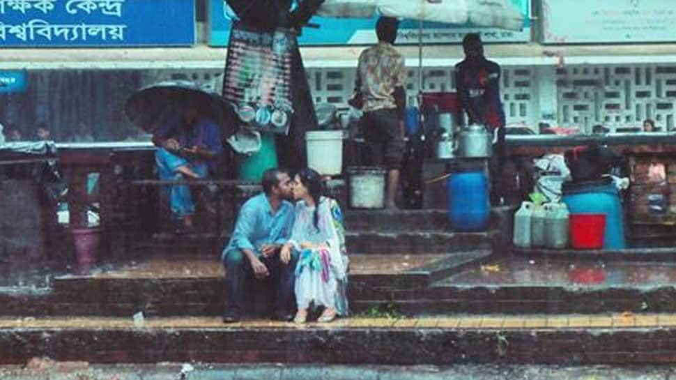 Bangladeshi photographer thrashed, fired from job for clicking young lovers kissing in rain  
