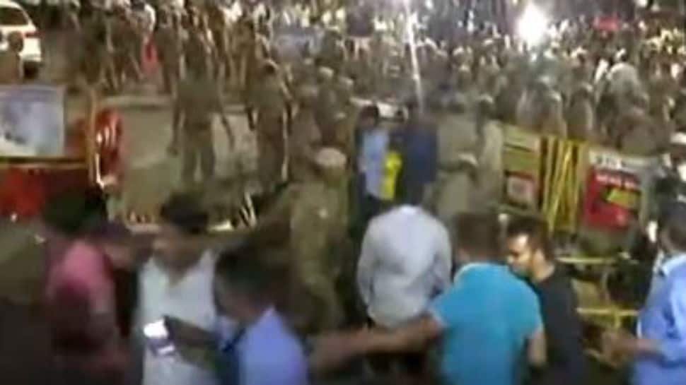 Well-wishers of M Karunanidhi lathi charged outside Chennai hospital