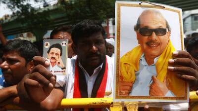 DMK supporters gather outside hospital 