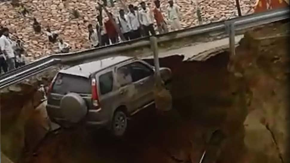 Newly-bought SUV falls into 50 feet deep pit on Agra-Lucknow expressway after road caves in - Watch