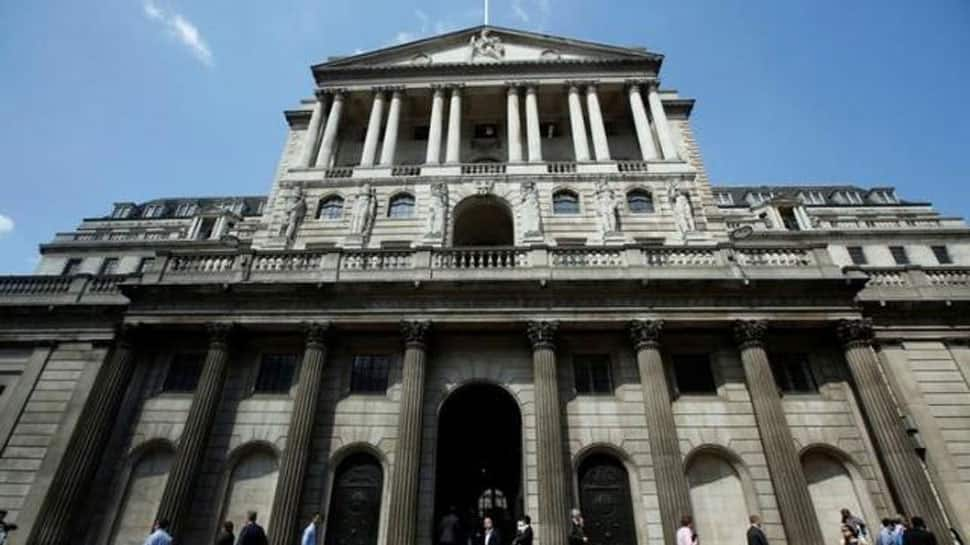 Bank of England raises rates above crisis lows, signals no rush for next hike