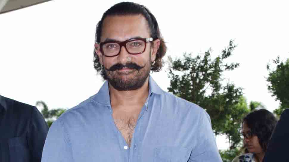 Aamir Khan spotted reading Mahabharata at airport. Is Rs 1000 cr project on the cards?