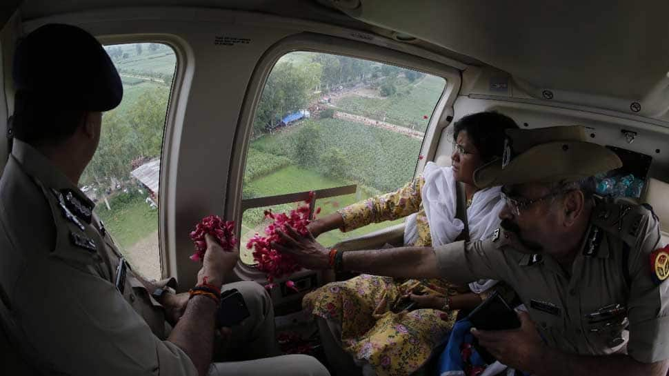 UP top cop showers rose petals on Kanwariyas from helicopter – WATCH