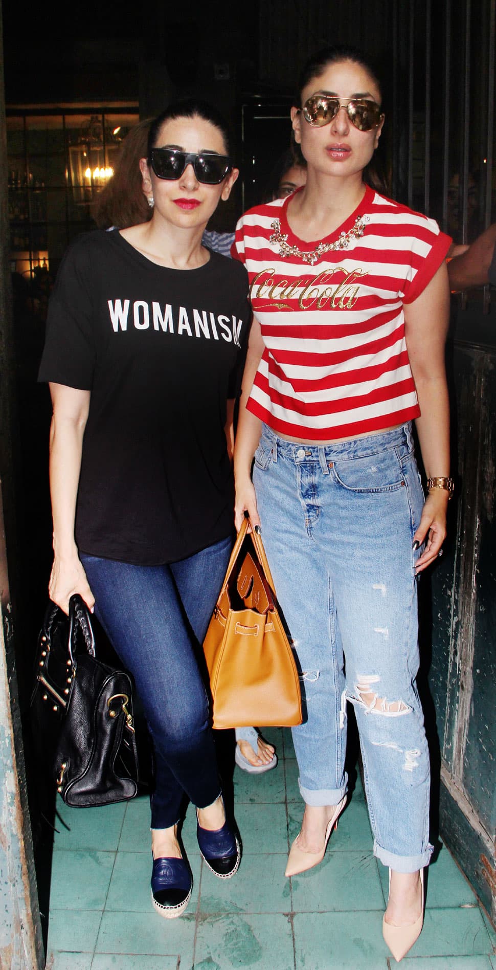 Karisma and Kareena pose for the shutterbugs. 