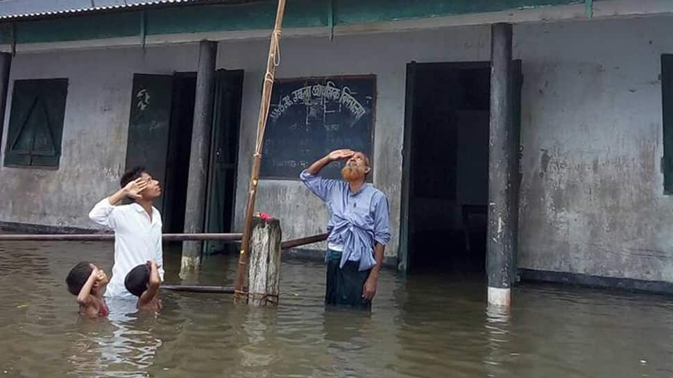 Boy who saluted Tricolour in chest-deep flood water not in Assam NRC draft