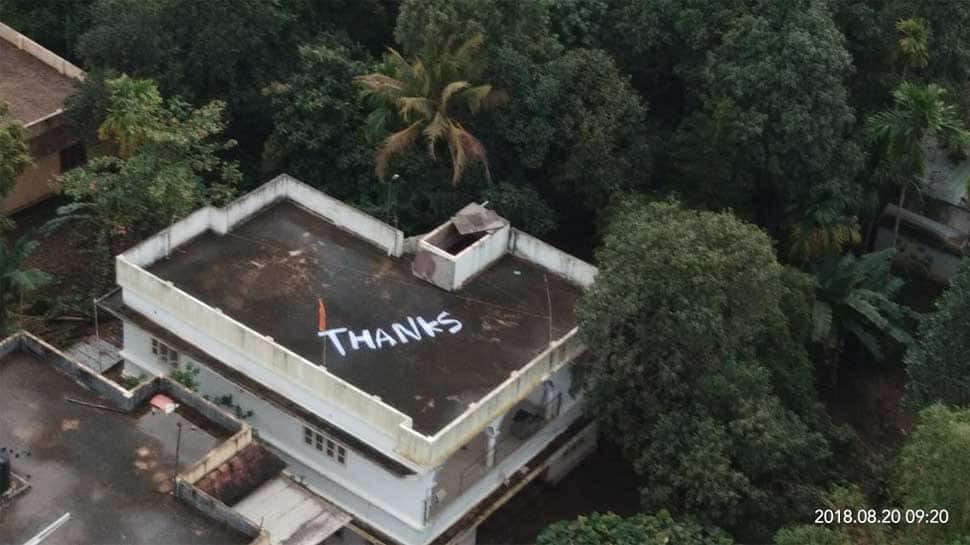 Thank You note painted on roof of house in Kerala from where Navy rescued two women - In pics