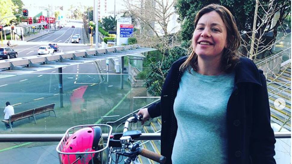 New Zealand minister cycles to hospital to give birth to her first baby