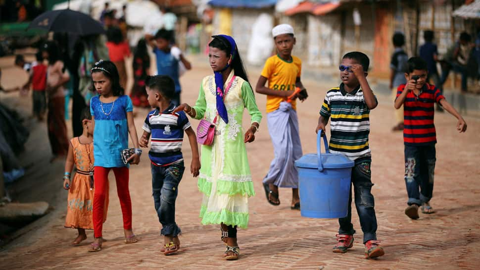 A year on, Rohingya still fleeing Myanmar for crowded camps