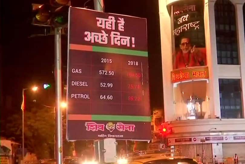 Yehi hai acche din: Shiv Sena puts up posters highlighting hike in fuel prices Yehi hai acche din: Shiv Sena puts up posters highlighting hike in fuel prices