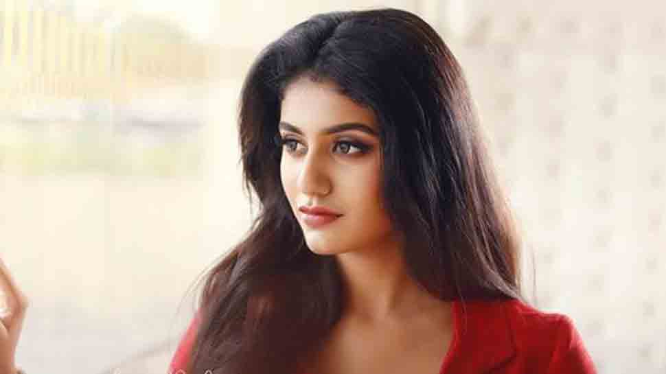 Wink queen Priya Prakash Varrier slays it in a red outfit, kohled eyes in latest photoshoot