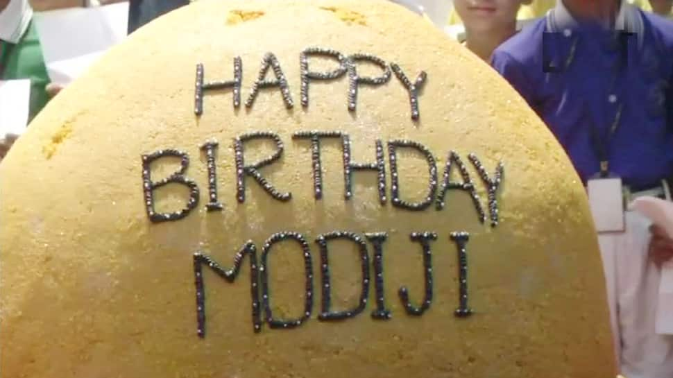 Javadekar, Naqvi celebrate PM Modi’s birthday by cutting giant 568 kg Laddu