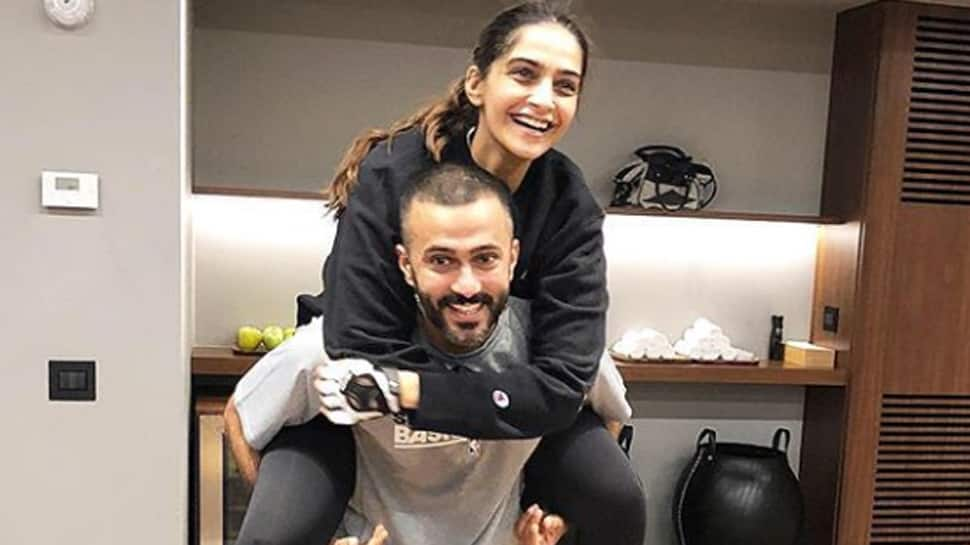 Sonam Kapoor piggybacks on hubby Anand Ahuja and the pic spills love!