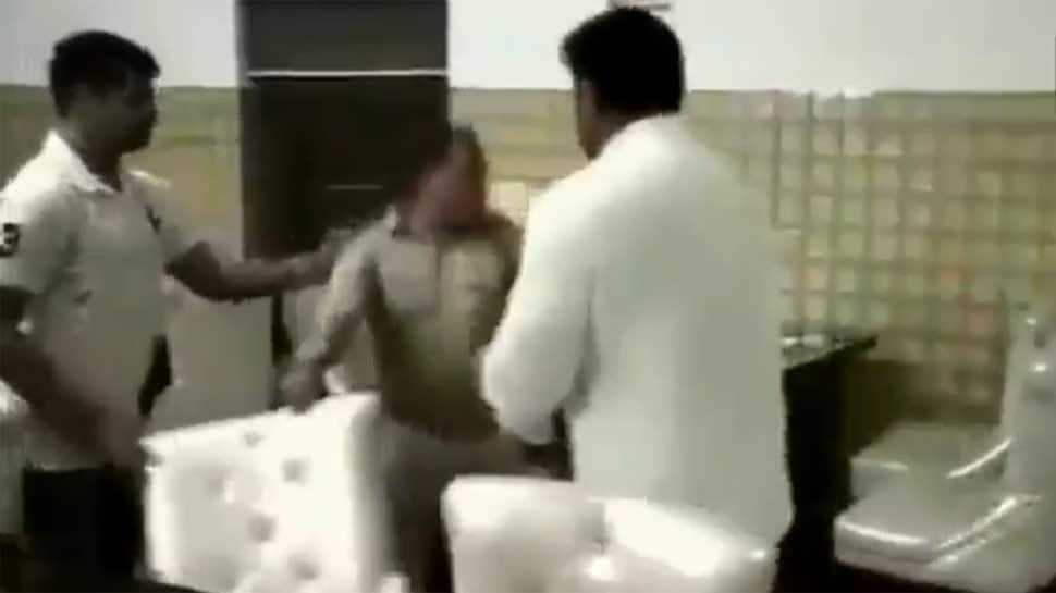 BJP councillor Manish Kumar thrashes sub-inspector who came to his hotel with a lady, arrested - Watch