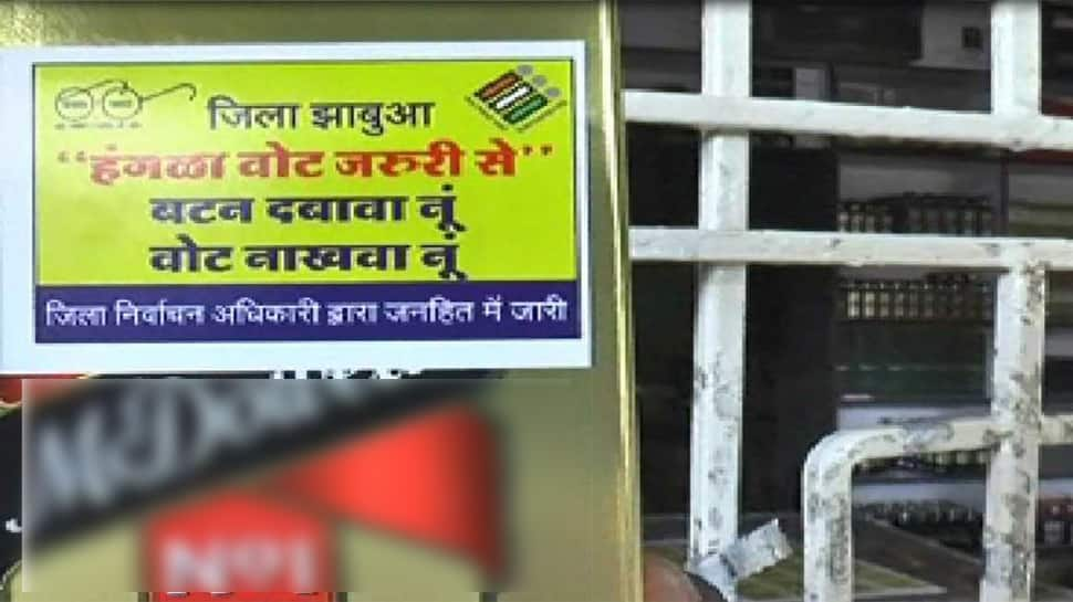 In MP&#039;s Jhabhua, officials use stickers on liquor bottles for voter awareness, later roll back plan