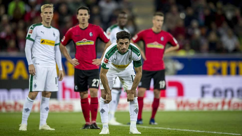 Borussia Mönchengladbach miss chance to go top after 3-1 loss at Freiburg