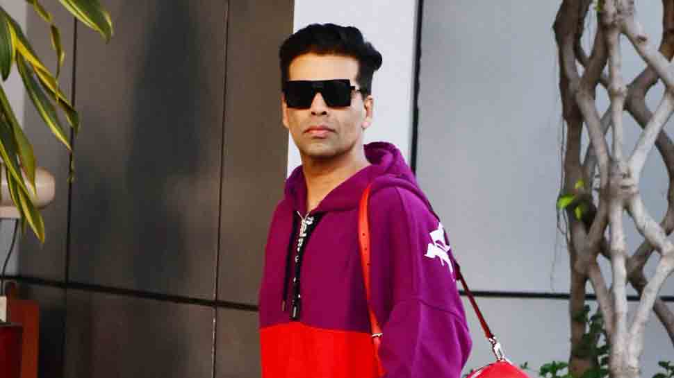 Karan Johar makes a colourful entry at Mumbai airport — Check out his photos