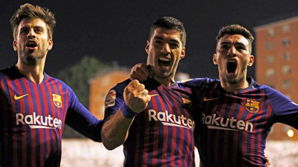 La Liga: Luis Suarez strikes late as Barca snatch victory at Rayo Vallecano