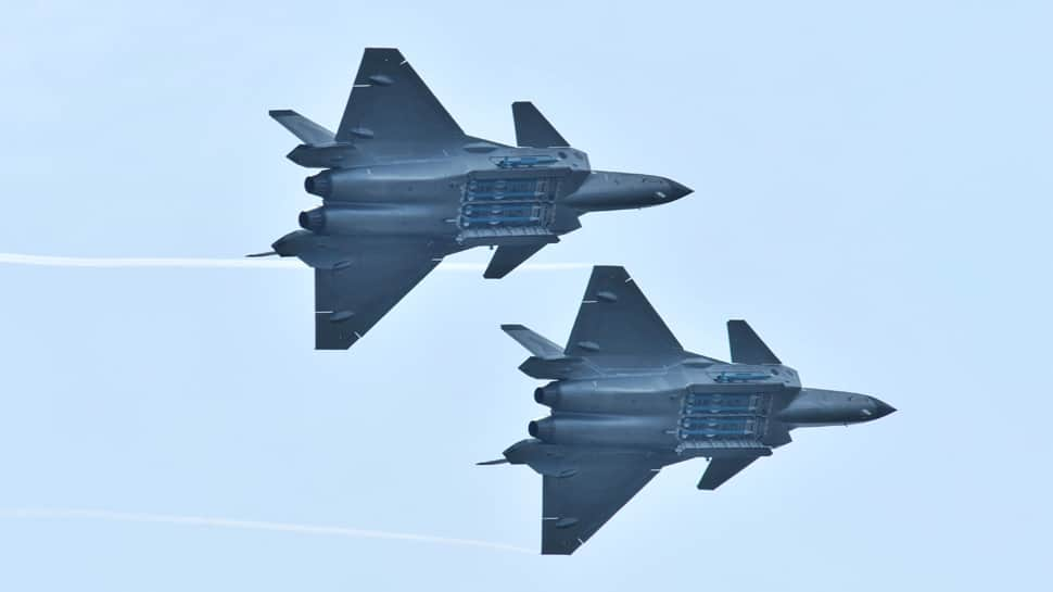 China flexes muscles, shows J-20 jet’s missiles for the first time at airshow