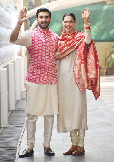 Deepika and Ranveer - Mrs and Mr Bhavnani greet media outside their residence