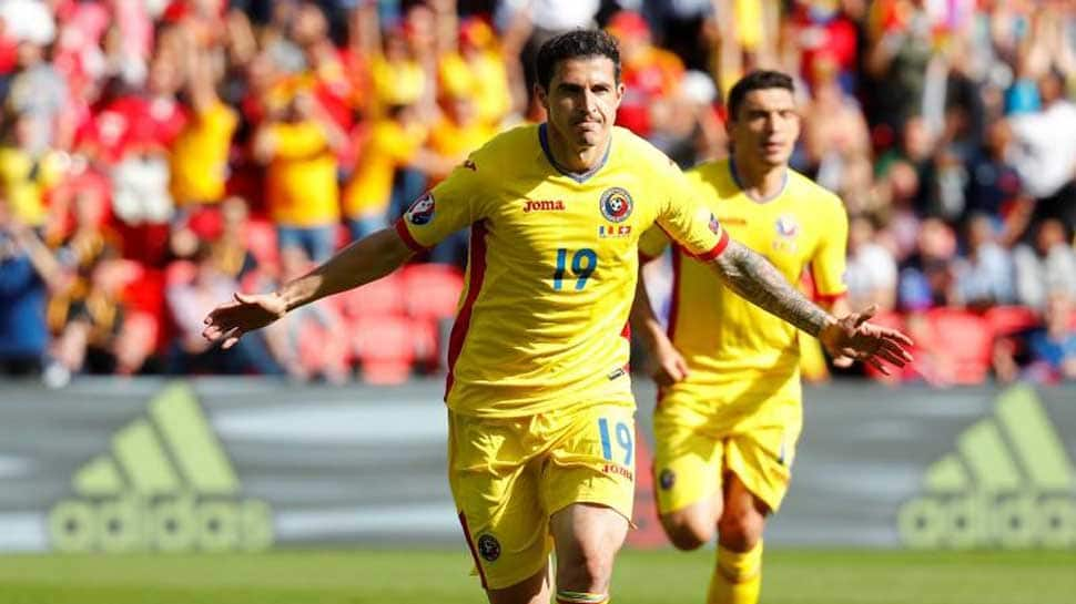 Romania outclass Lithuania to keep alive promotion hopes