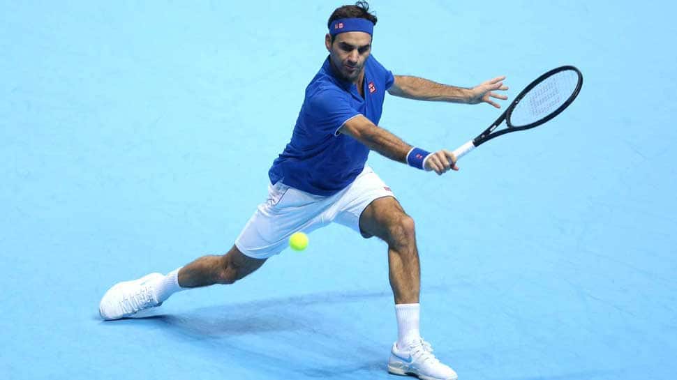 Federer must wait for 100th title, but happy with season