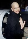 Sonali Bendre waves at paps