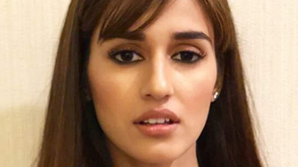 Disha Patani flaunts her washboard abs, poses in black lingerie—Pic