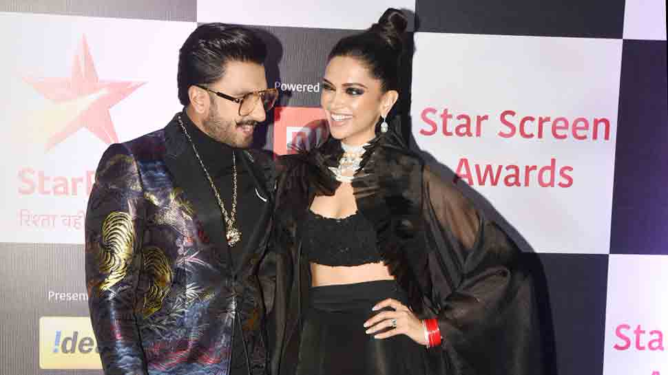 Deepika Padukone, Ranveer Singh walk hand-in-hand at red carpet in colour-coordinated outfits