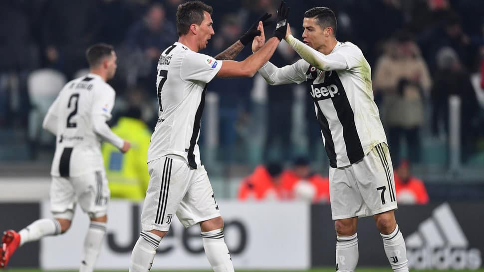 Juventus beat Roma to stay undefeated in Serie A