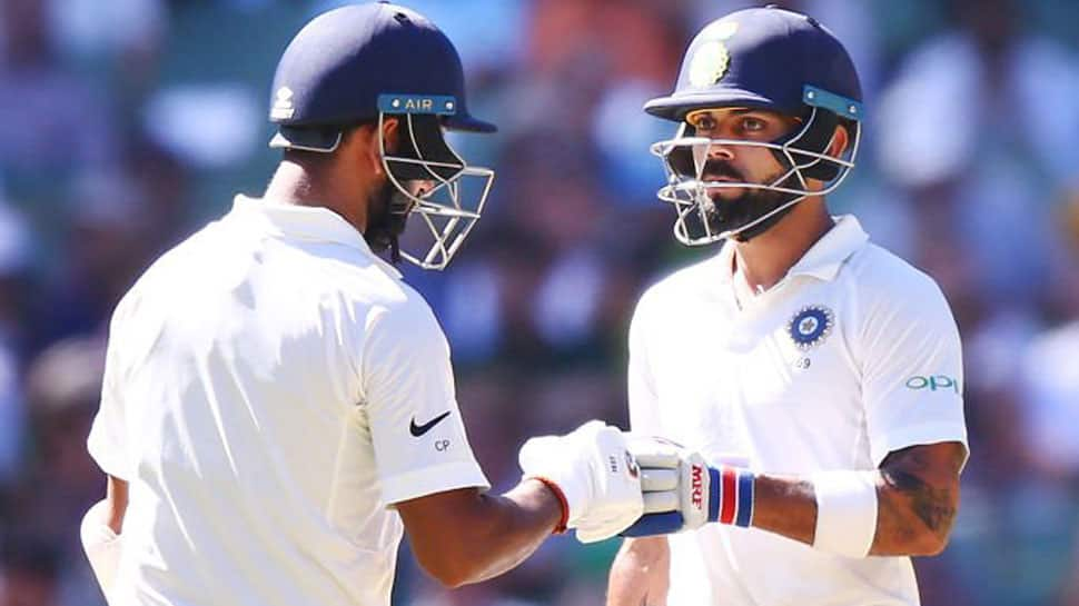 Cheteshwar Pujara and Virat Kohli combine to frustrate Australia on Boxing Day 