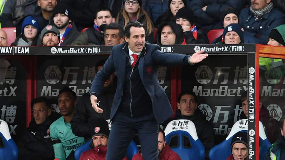 Arsenal manager Unai Emery charged for kicking bottle at fan