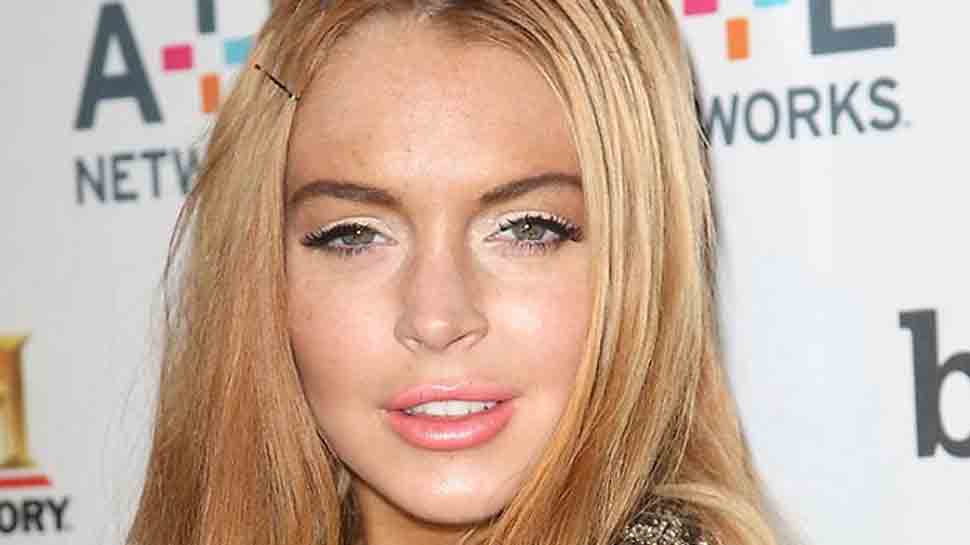 Lindsay Lohan Playboy - Lindsay Lohan goes nude for photo, gets slammed by fans | People News | Zee  News