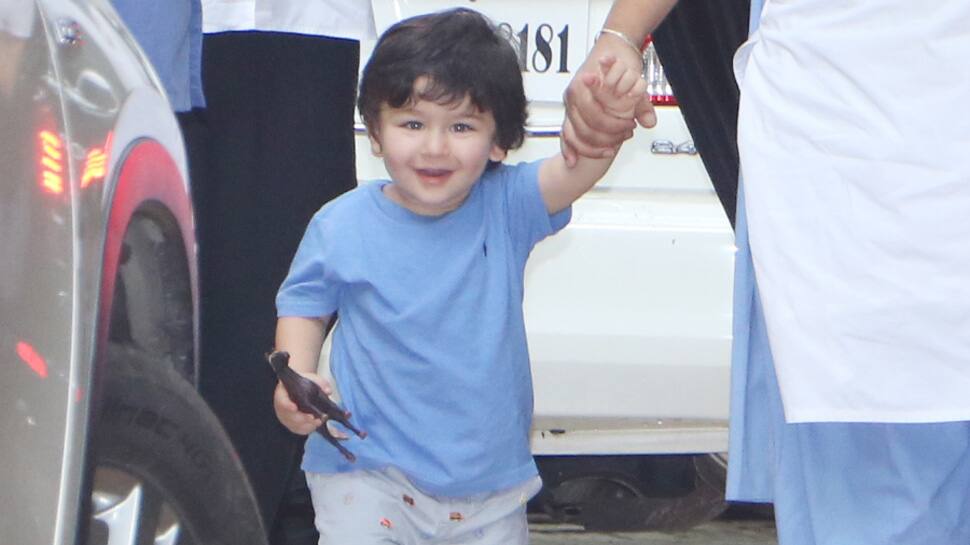 Taimur Ali Khan&#039;s latest pic with mommy Kareena and daddy Saif is breaking the internet—See pic