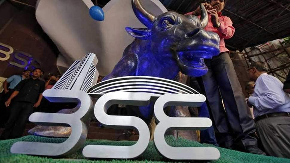 Sensex builds on gains; Nifty claims 10,800 mark