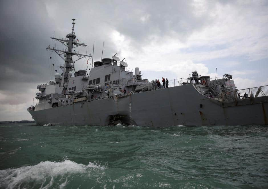 US navy ship sails in disputed South China Sea amid trade talks with Beijing