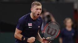Dan Evans shoulders slim British hopes against Roger Federer