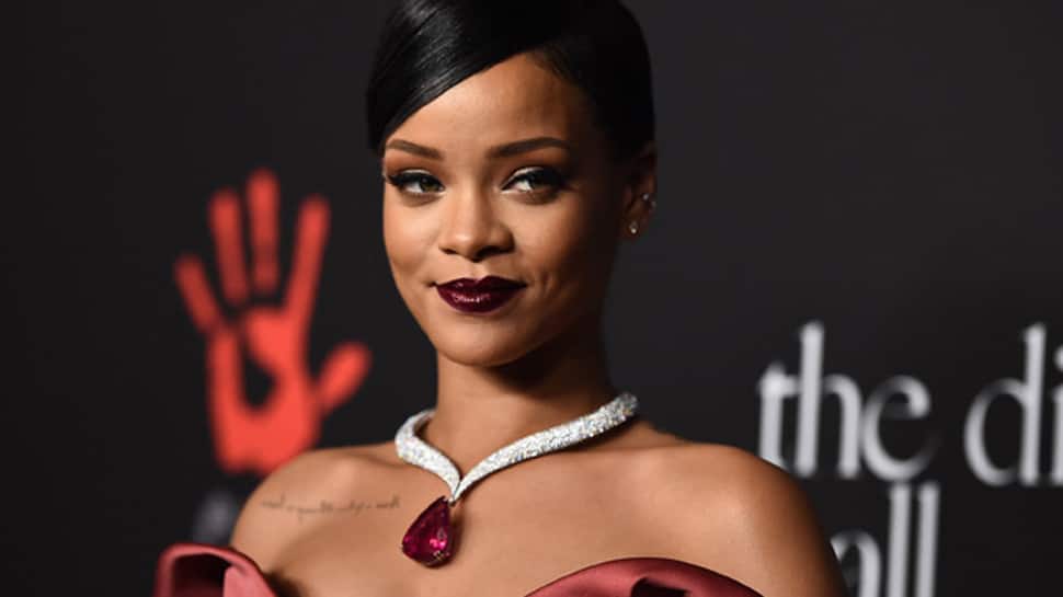 Rihanna sues her father