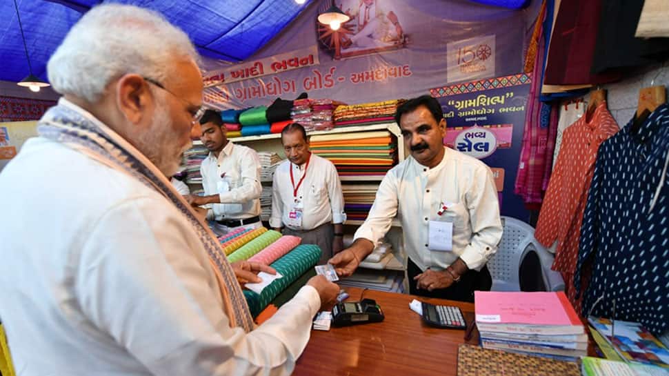 Couldn&#039;t resist shopping: PM Modi buys Khadi jacket, pays with RuPay card