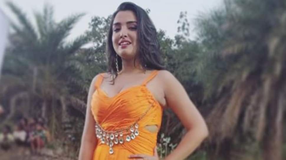 Amrapali Dubey raises the mercury in a thigh-high slit gown—Pic