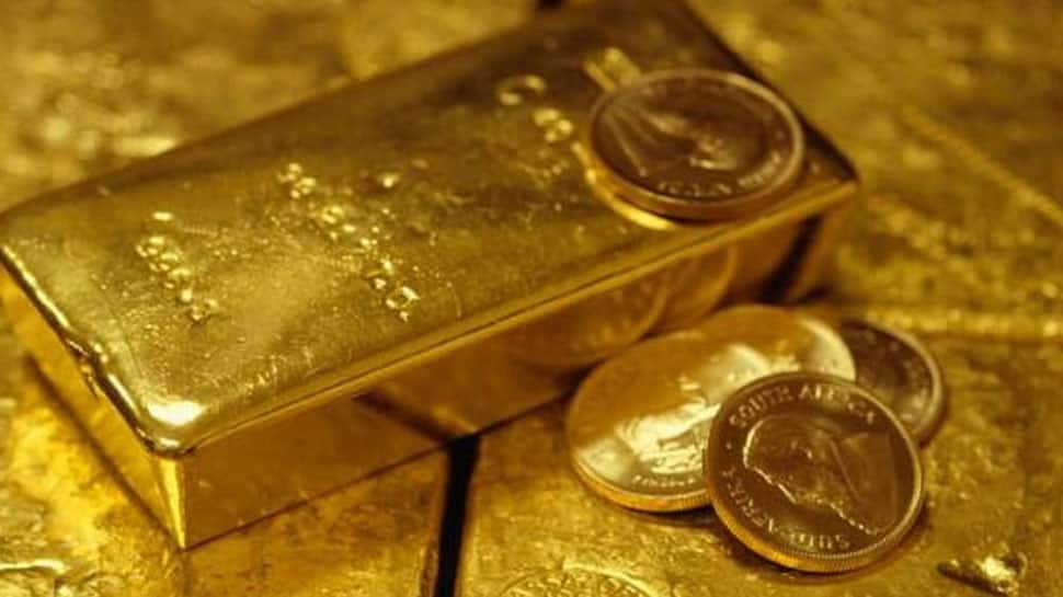 Gold back on upward path as global growth slows: Reuters poll