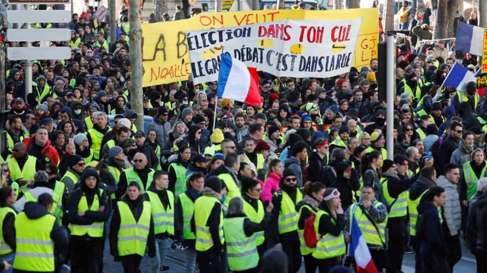 French &#039;yellow vests&#039; march through Paris denouncing police violence