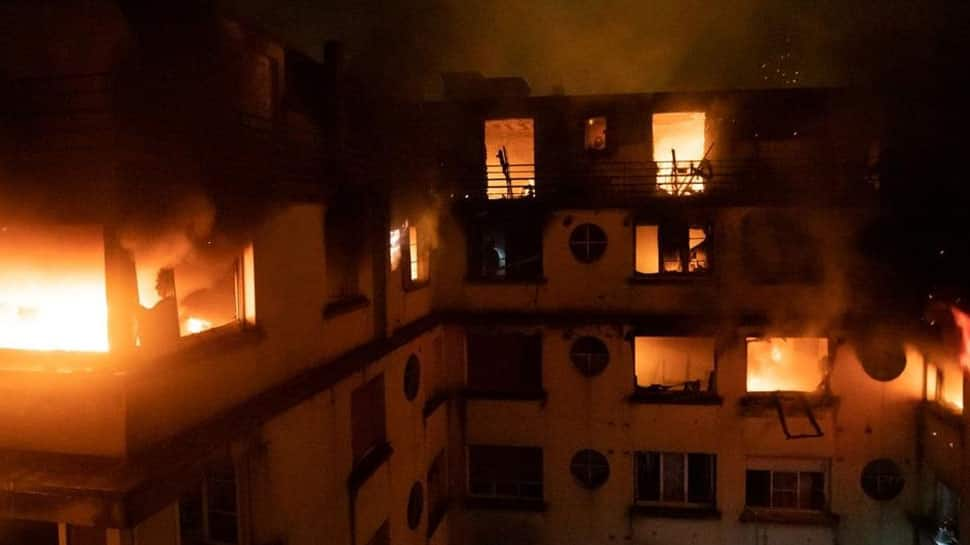 Blaze kills 10 in Paris apartment block, arson suspected