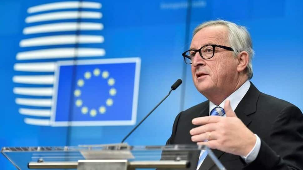 EU rejects renegotiating Brexit deal as May arrives in Brussels