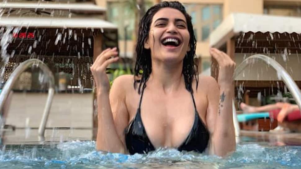 Karishma Tanna dons a black bikini, enjoys her pool time—Pics