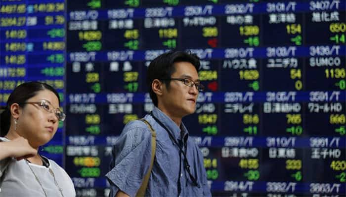 Asian shares fall from five-month highs, pound jumps on Brexit delay hopes